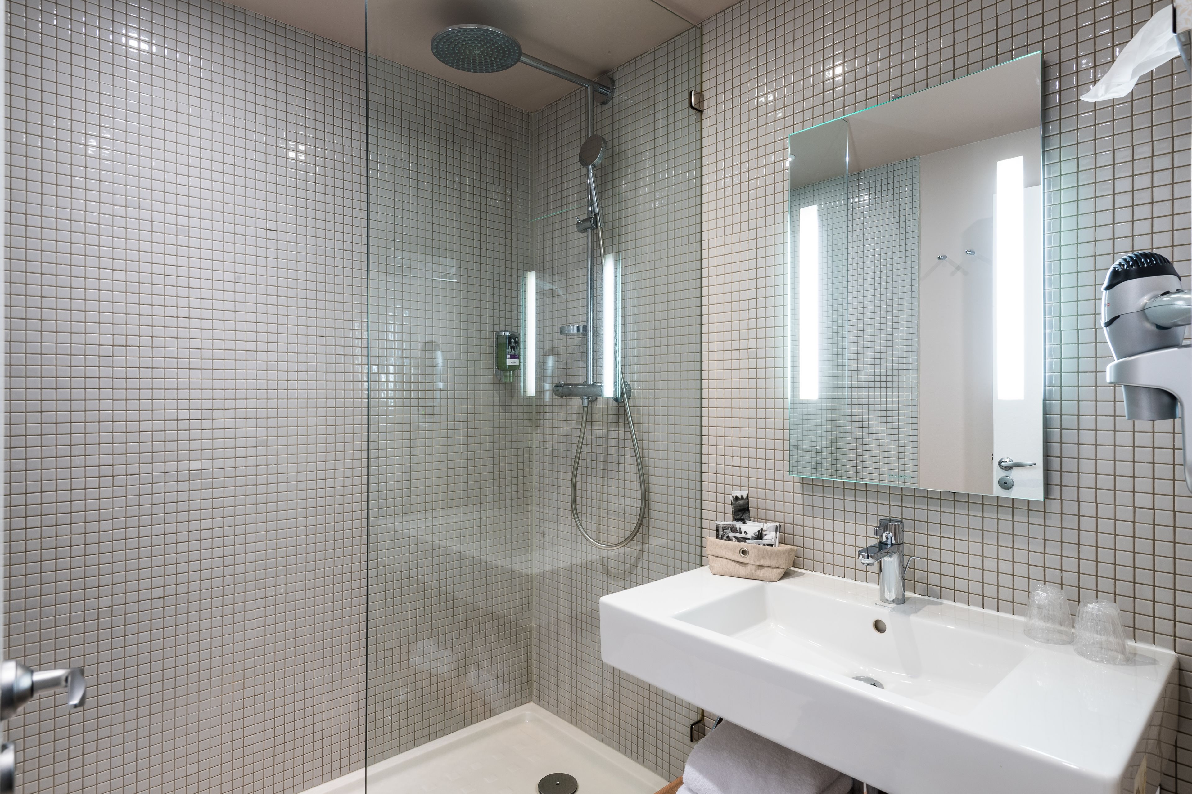 eco-friendly toiletries, hair dryer, towels, soap