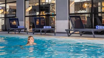 Indoor pool, open 9:30 AM to 11:00 PM, pool loungers