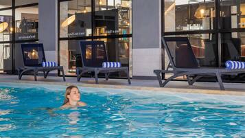 Indoor pool, open 8:30 AM to 10:00 PM, pool loungers