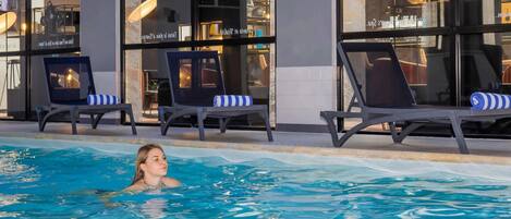 Indoor pool, open 7:00 AM to 10:00 PM, pool loungers