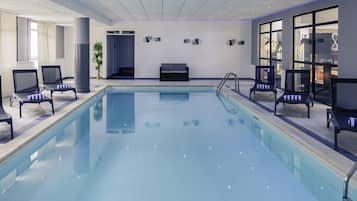 Indoor pool, open 9:30 AM to 11:00 PM, pool loungers