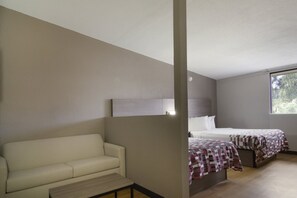 Suite, Non Smoking (2 Queen Beds & 1 Sofa Bed) | 1 bedroom, free cribs/infant beds, free WiFi, bed sheets
