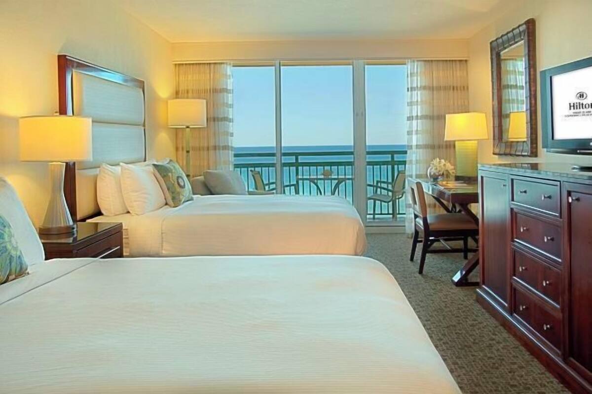 Premium bedding, down duvets, pillow-top beds, in-room safe