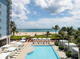 Outdoor pool, open 8:00 AM to 8:00 PM, cabanas (surcharge)