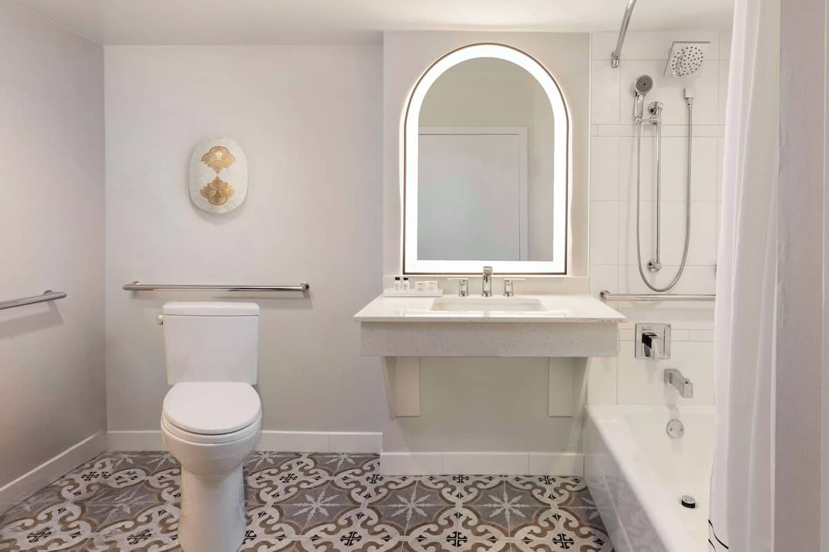 Designer toiletries, hair dryer, towels, soap