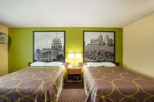 Desk, blackout drapes, iron/ironing board, cribs/infant beds