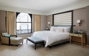 Premium bedding, down comforters, pillowtop beds, minibar