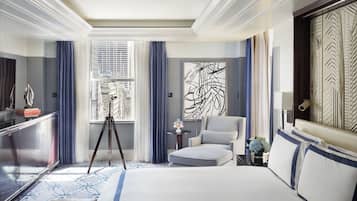 Premium bedding, down comforters, pillowtop beds, minibar