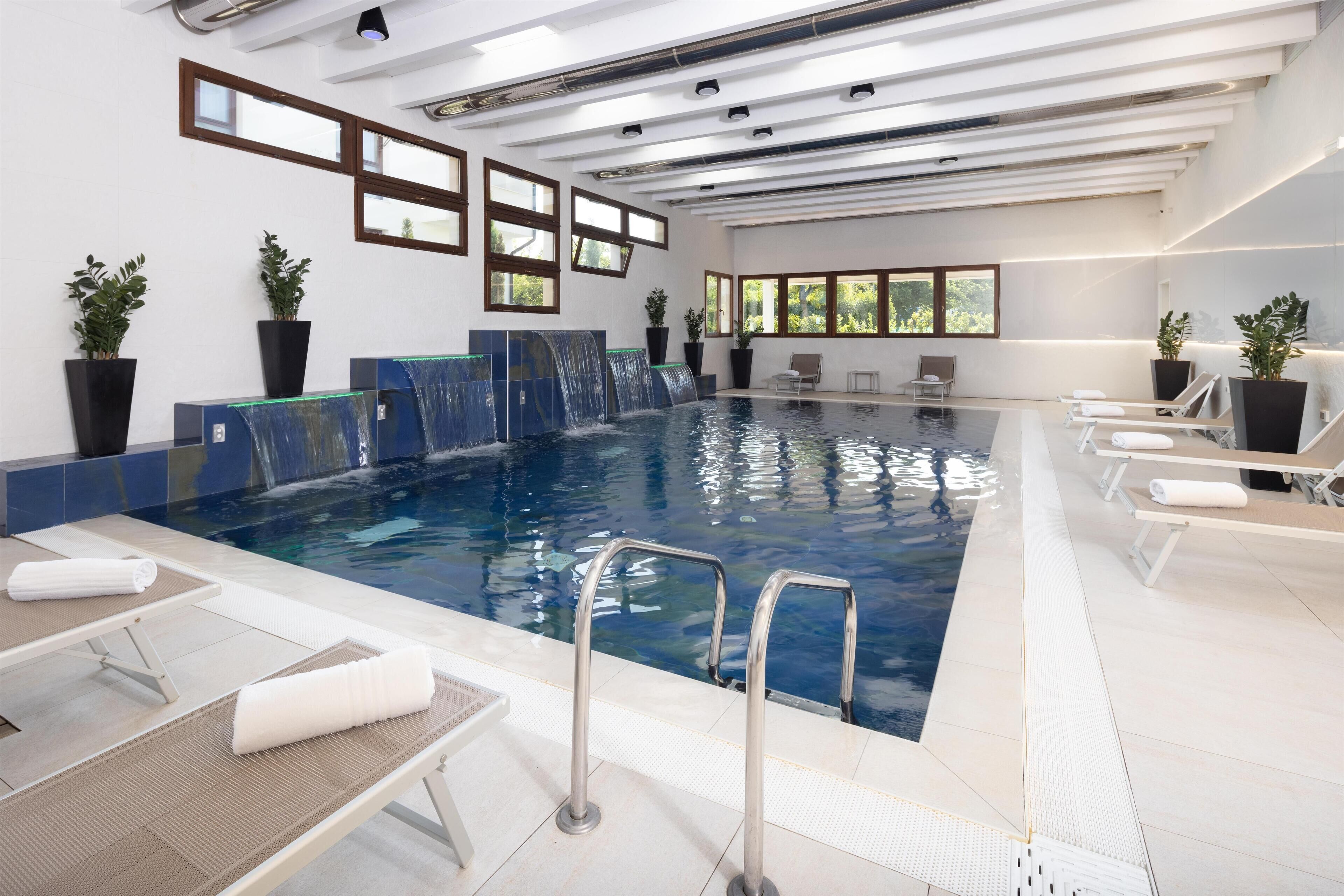 Indoor pool, open 6:30 AM to 10:30 PM, sun loungers