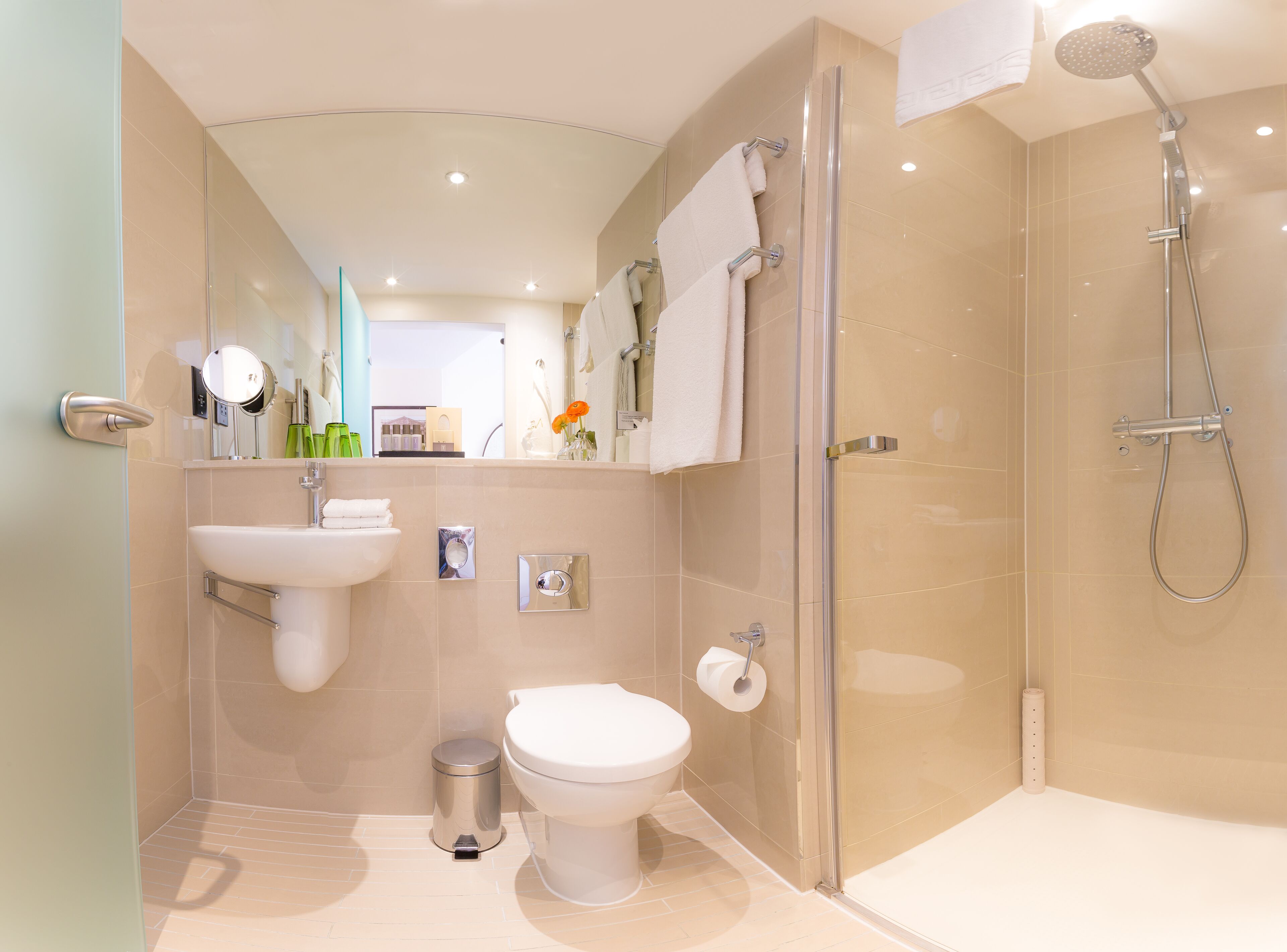 rainfall showerhead, designer toiletries, hair dryer, bathrobes