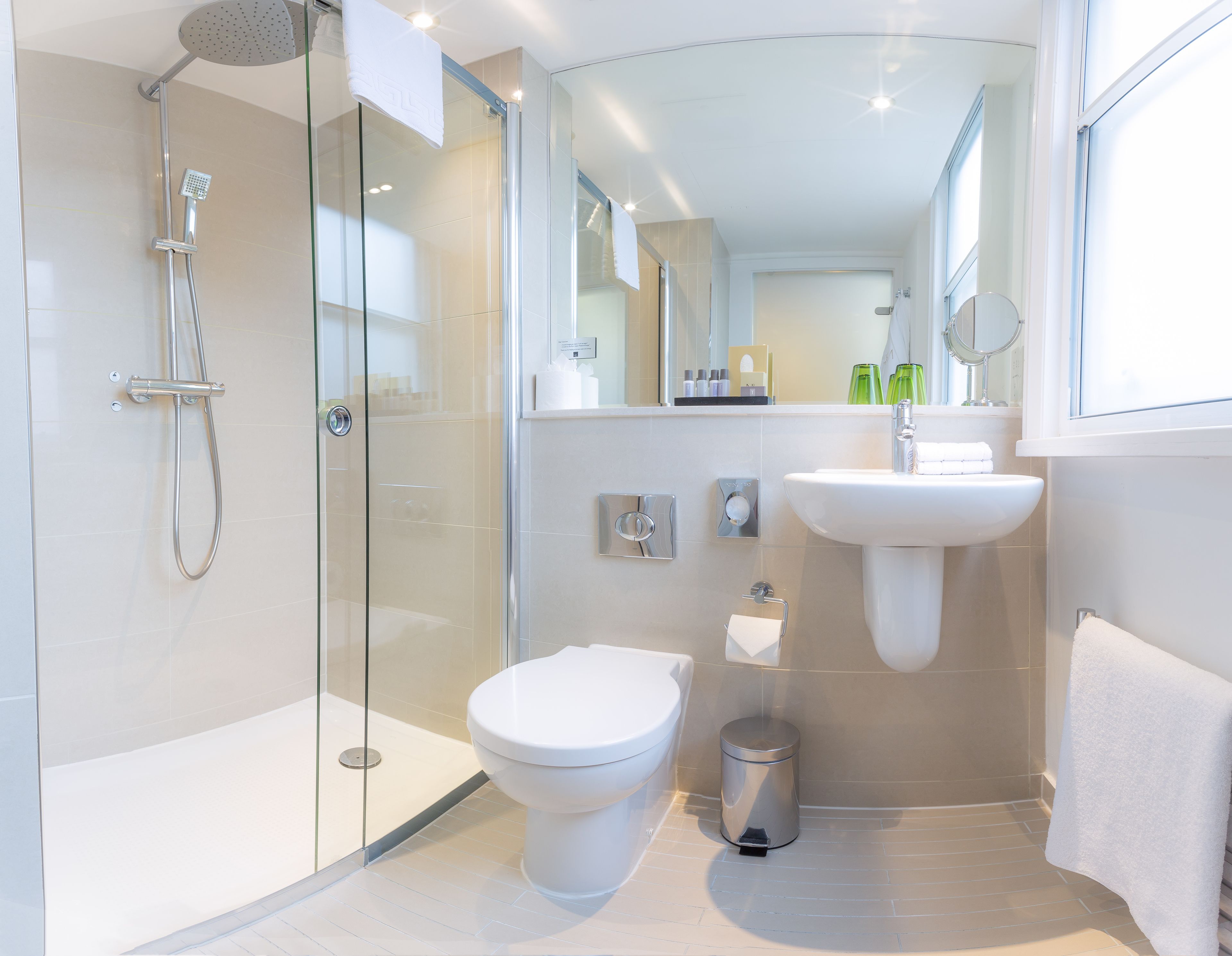 rainfall showerhead, designer toiletries, hair dryer, bathrobes