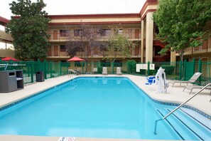 Outdoor pool, open 8:00 AM to 10:00 PM, pool umbrellas, sun loungers