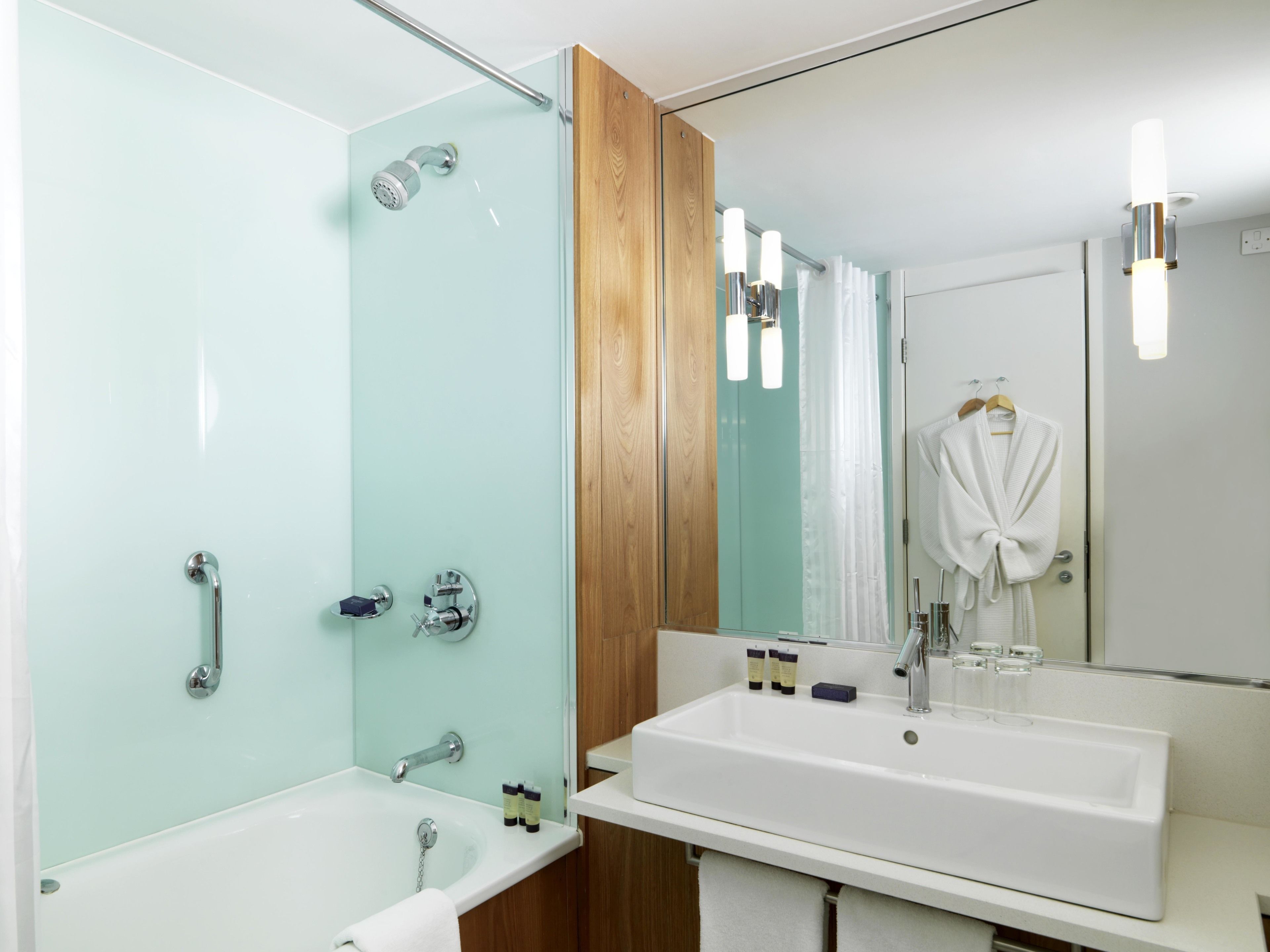 combined shower/bathtub, free toiletries, hair dryer, bathrobes