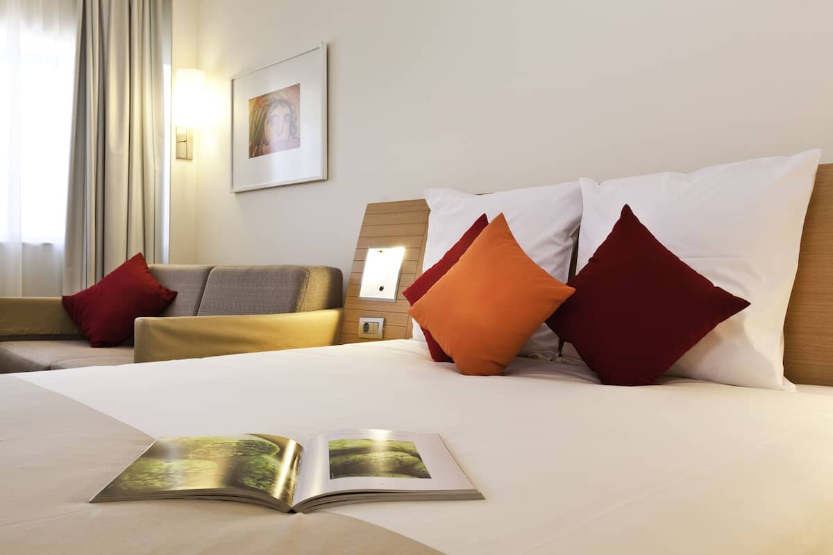Premium bedding, memory foam beds, minibar, in-room safe
