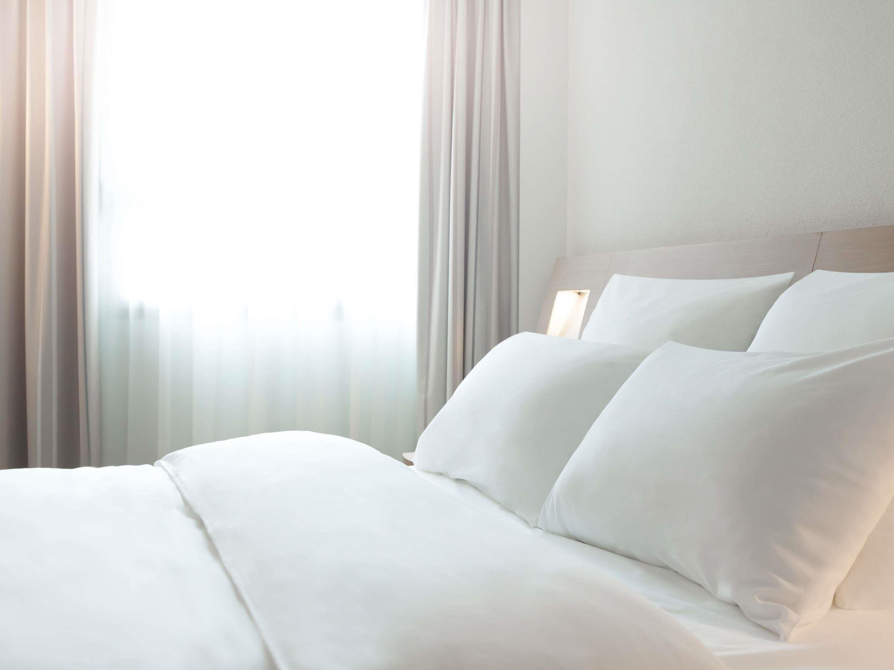 Premium bedding, memory foam beds, minibar, in-room safe