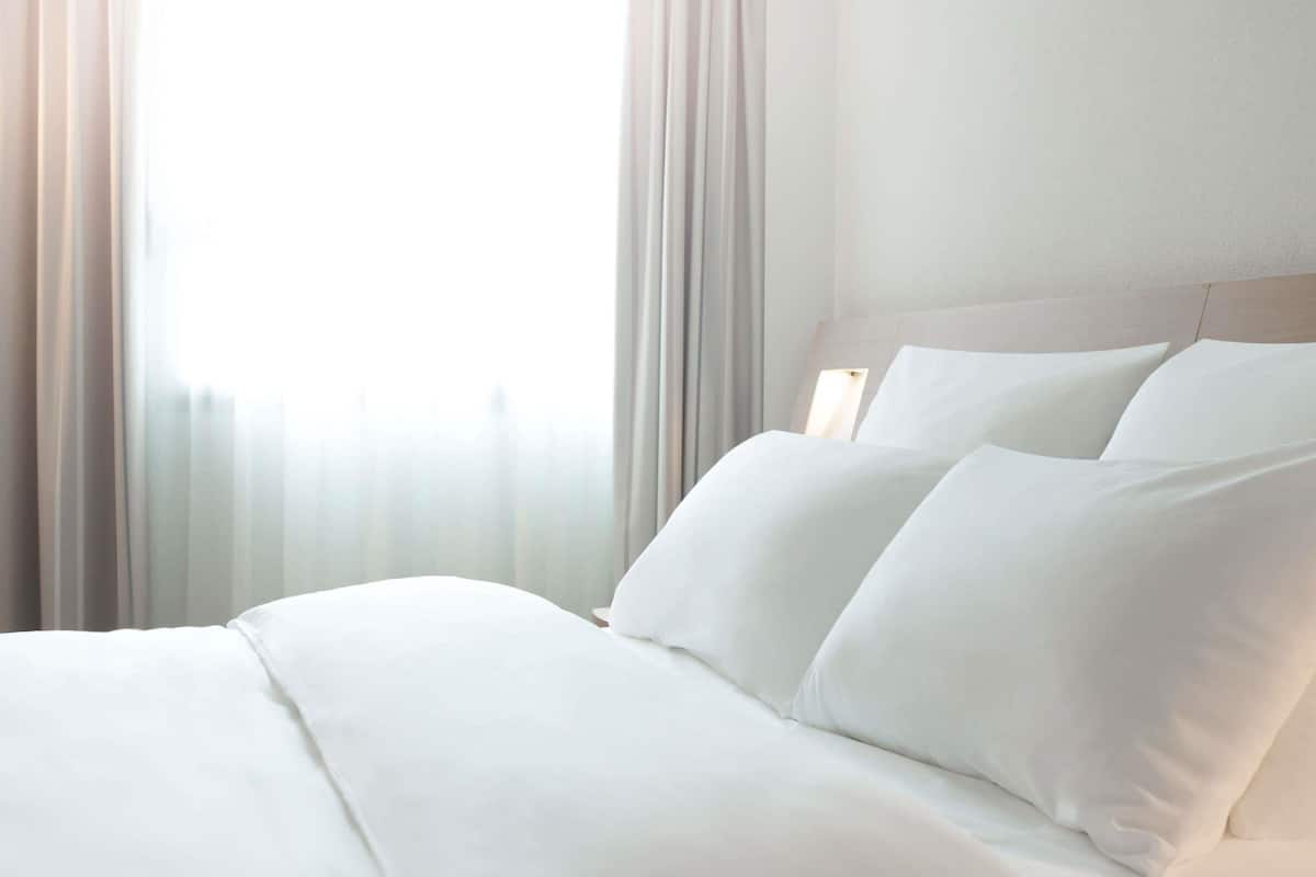 Premium bedding, memory foam beds, minibar, in-room safe