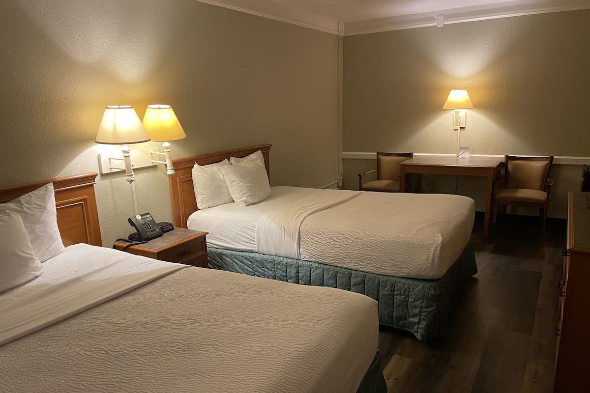Premium bedding, blackout curtains, iron/ironing board, free WiFi