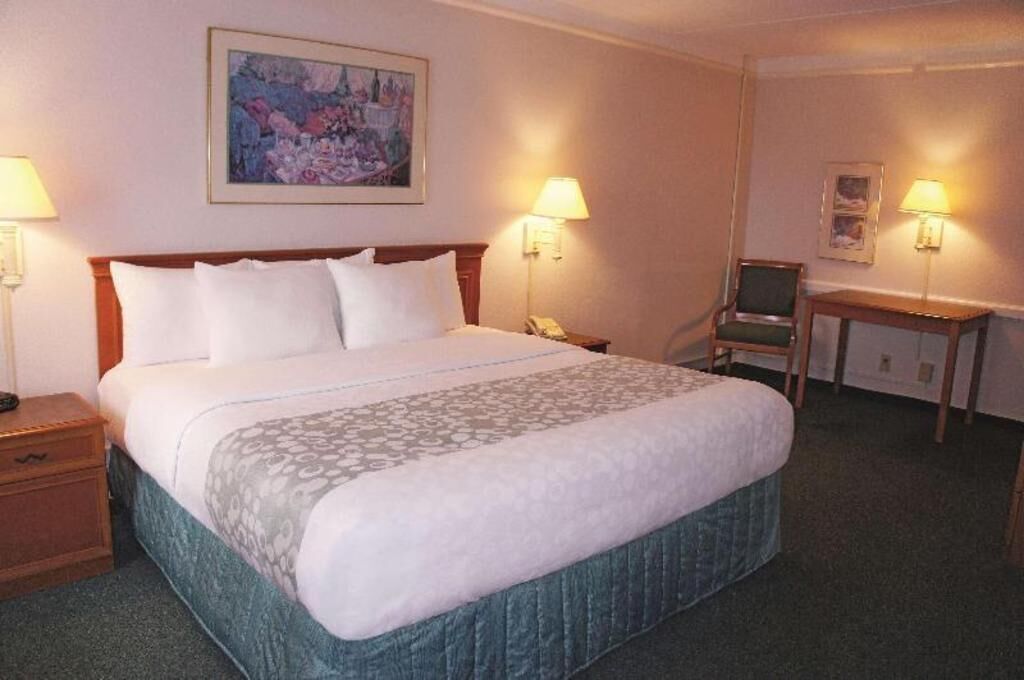 Premium bedding, blackout drapes, iron/ironing board, free WiFi