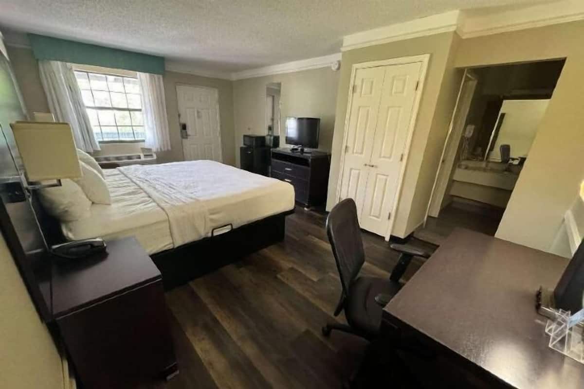 Premium bedding, blackout curtains, iron/ironing board, free WiFi