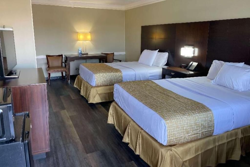 Premium bedding, blackout drapes, iron/ironing board, free WiFi