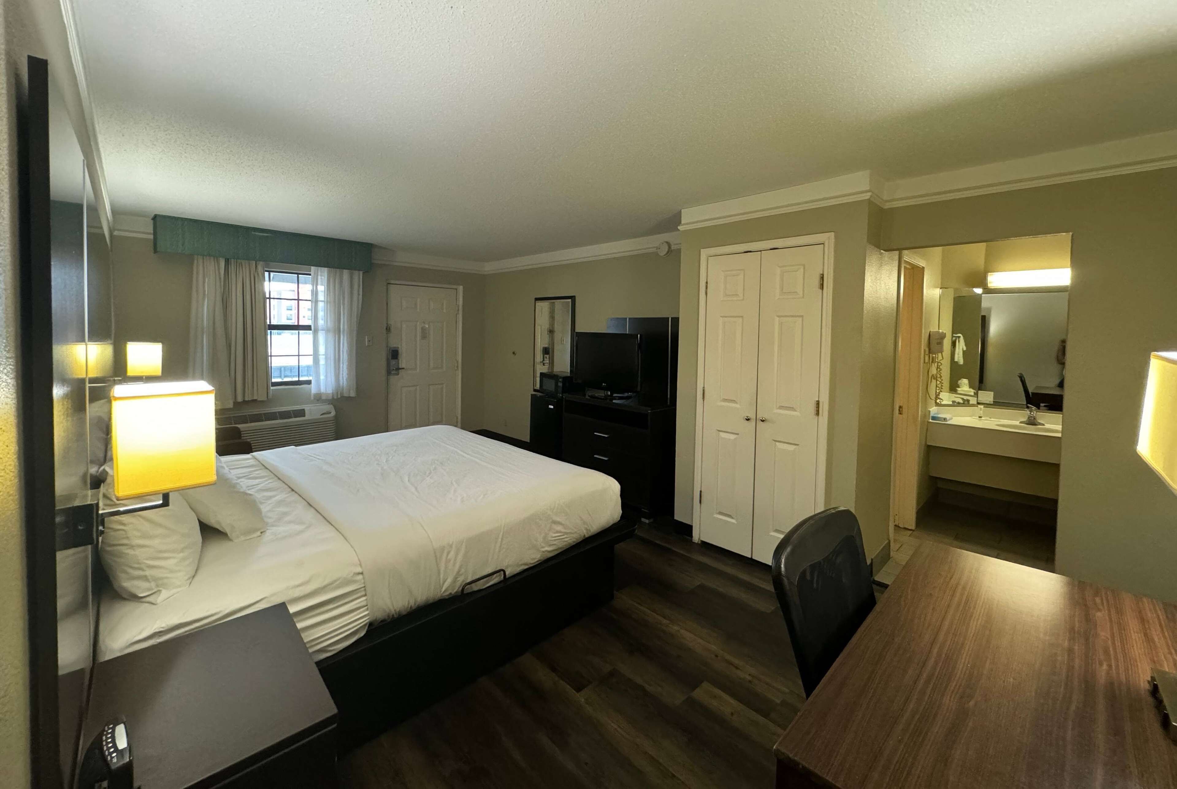 Premium bedding, blackout curtains, iron/ironing board, free WiFi