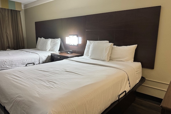 Premium bedding, blackout drapes, iron/ironing board, free WiFi
