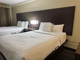 Premium bedding, blackout curtains, iron/ironing board, free WiFi