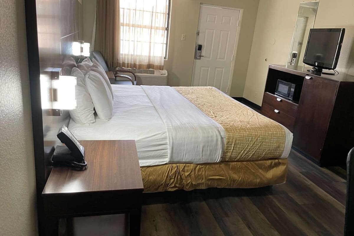 Premium bedding, blackout curtains, iron/ironing board, free WiFi