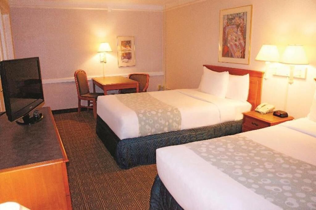 Premium bedding, blackout drapes, iron/ironing board, free WiFi