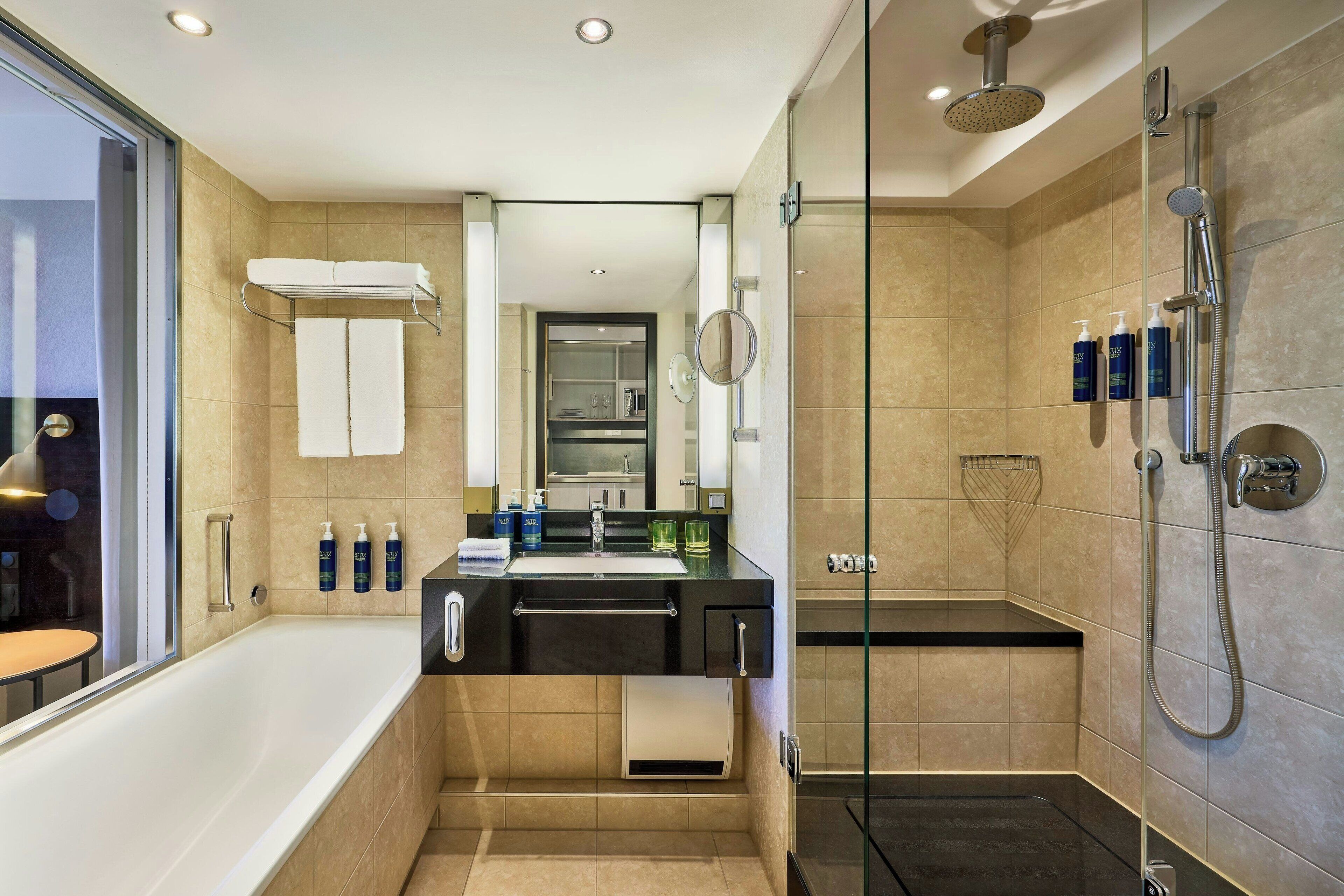 studio, 1 king bed, non smoking, balcony | bathroom | separate bathtub and shower, deep-soaking bathtub, rainfall showerhead