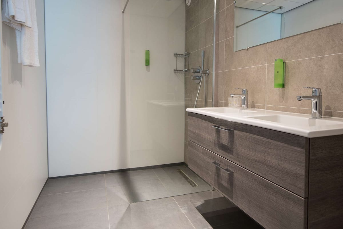 apartment, 2 single beds, kitchen | bathroom | shower, eco-friendly toiletries, hair dryer, towels