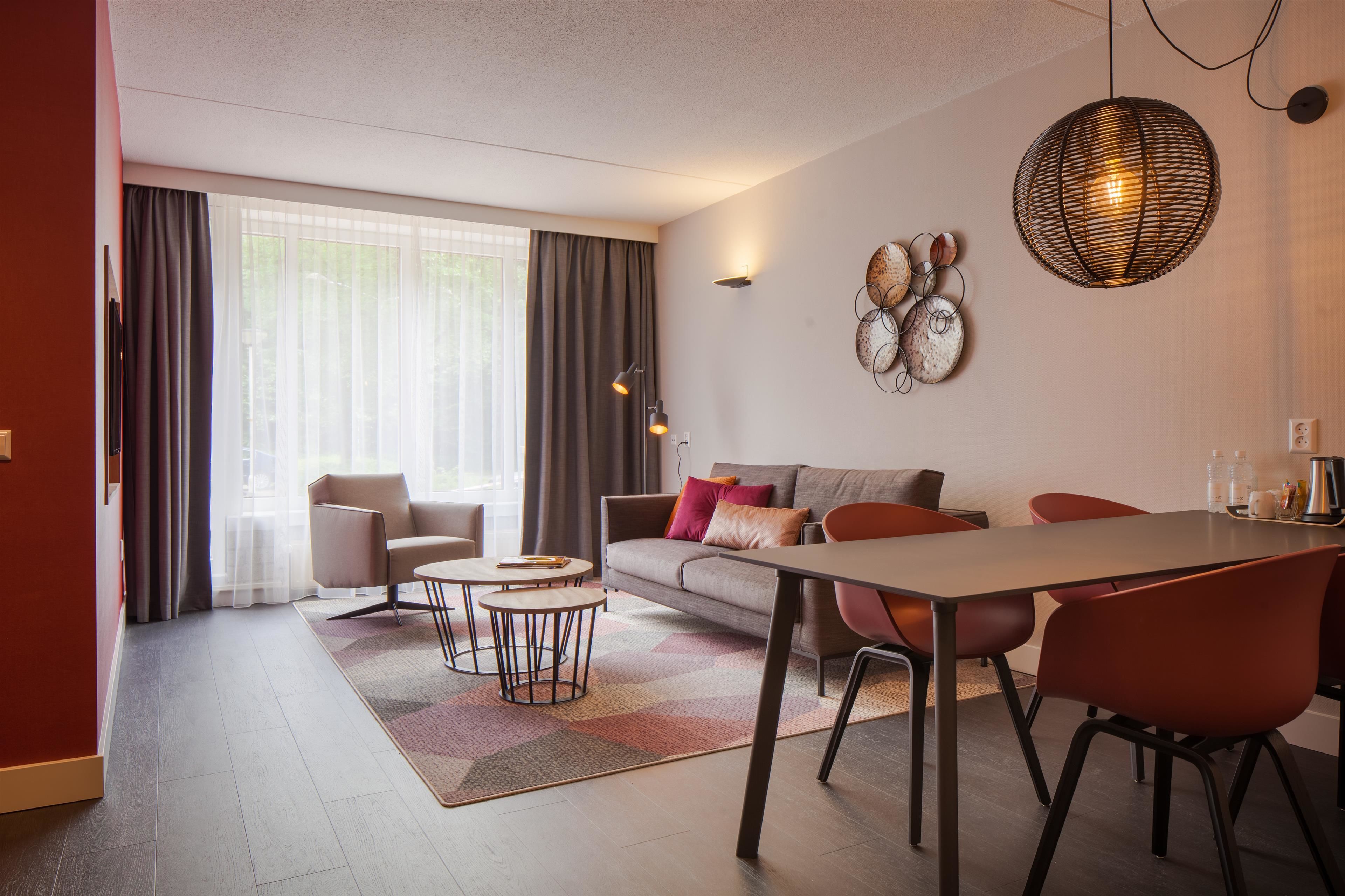 Appartement, 2 eenpersoonsbedden, keuken | Een kluis op de kamer, verduisterende gordijnen, gratis babybedden