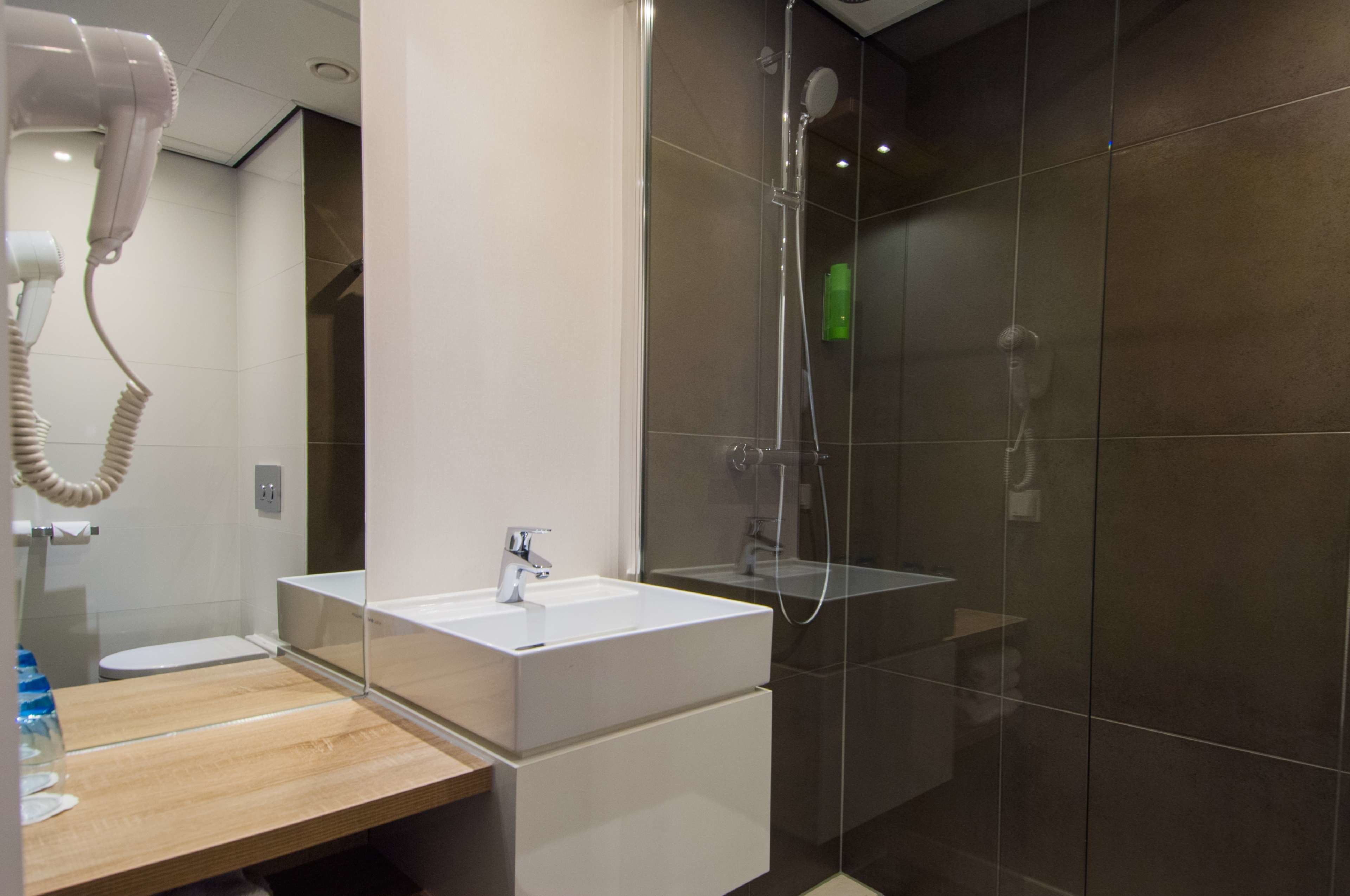 shower, eco-friendly toiletries, hair dryer, towels