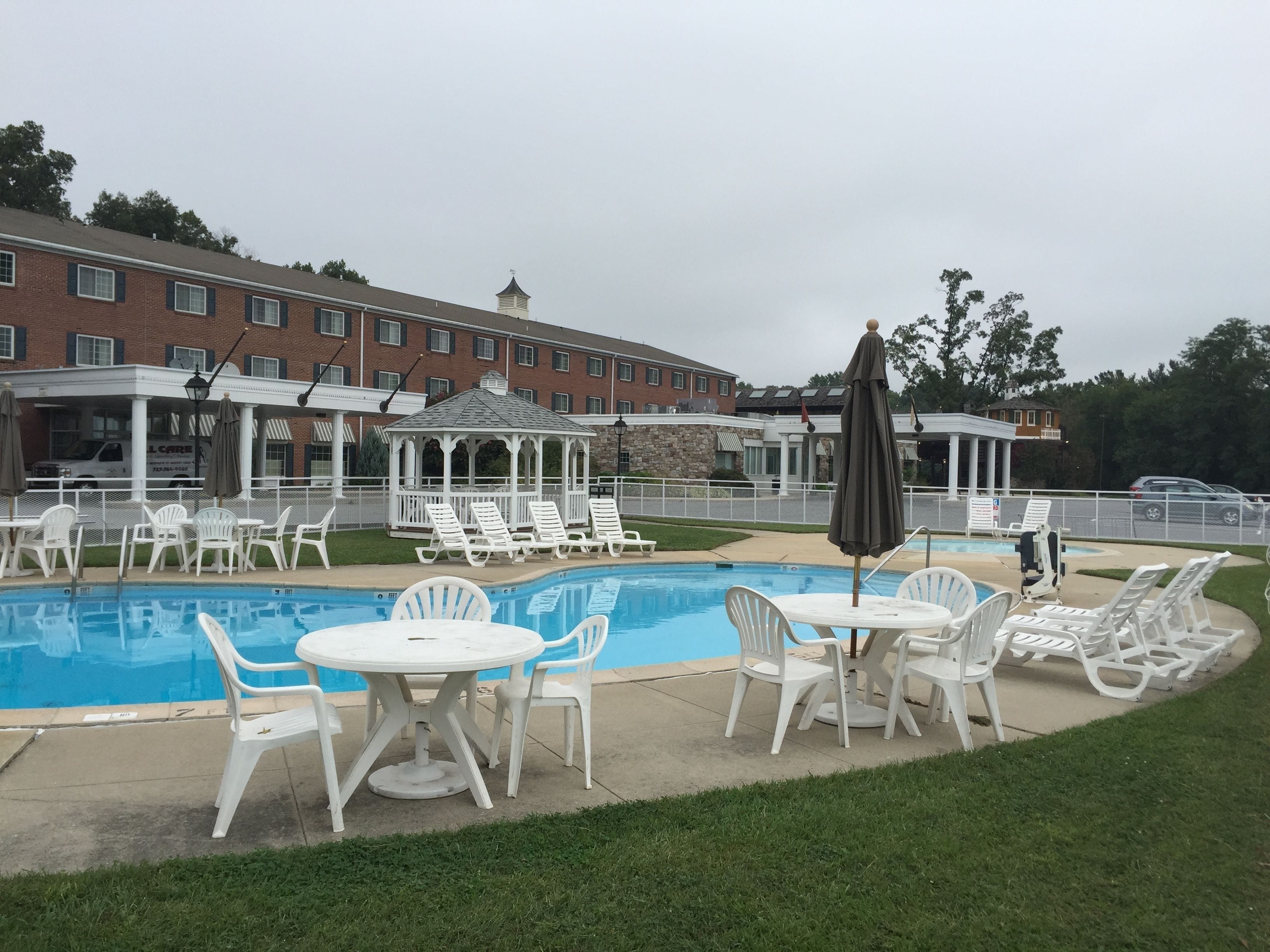 seasonal outdoor pool, pool umbrellas