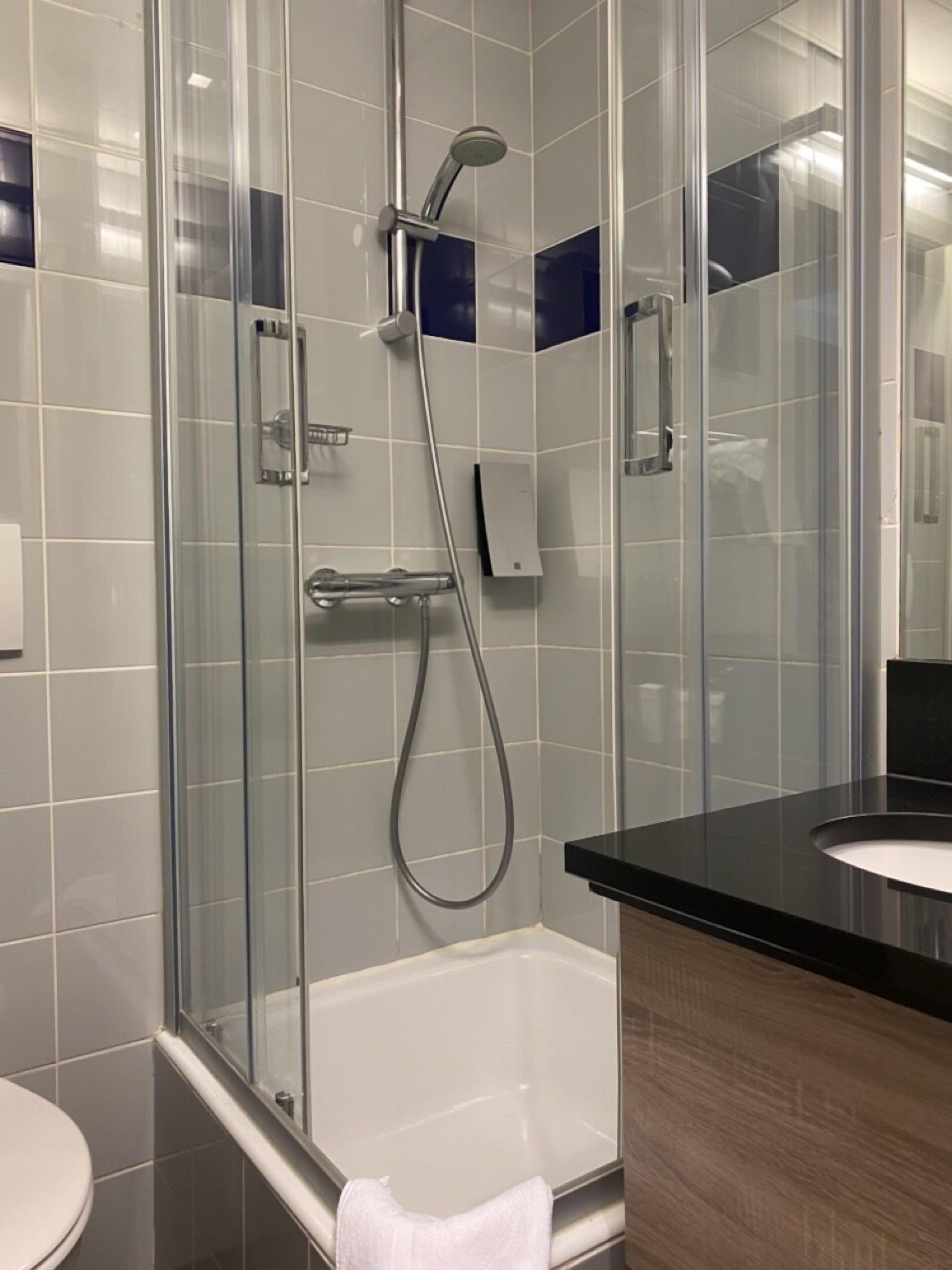 classic double room | bathroom | hair dryer, towels