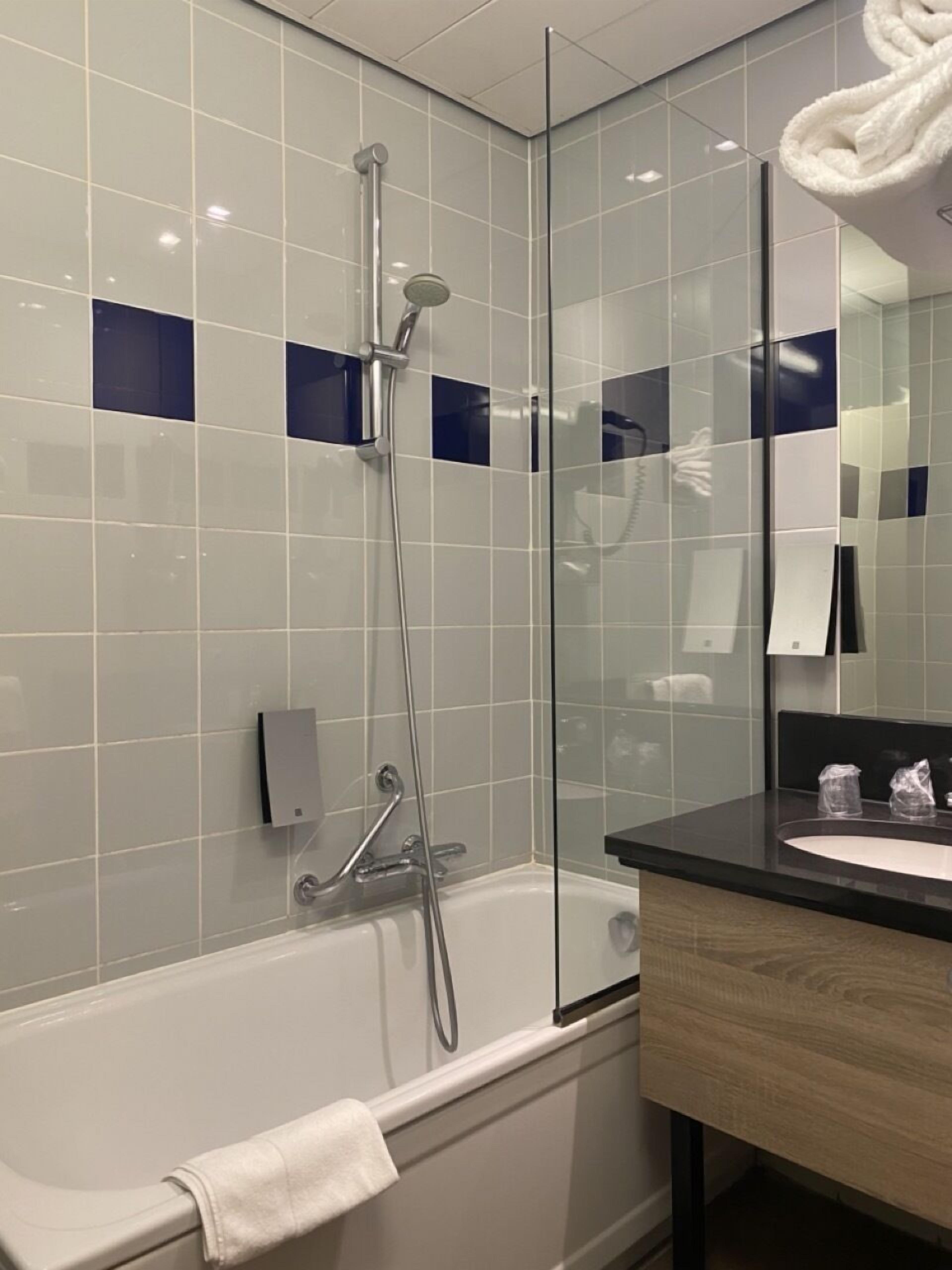 classic double room | bathroom | hair dryer, towels