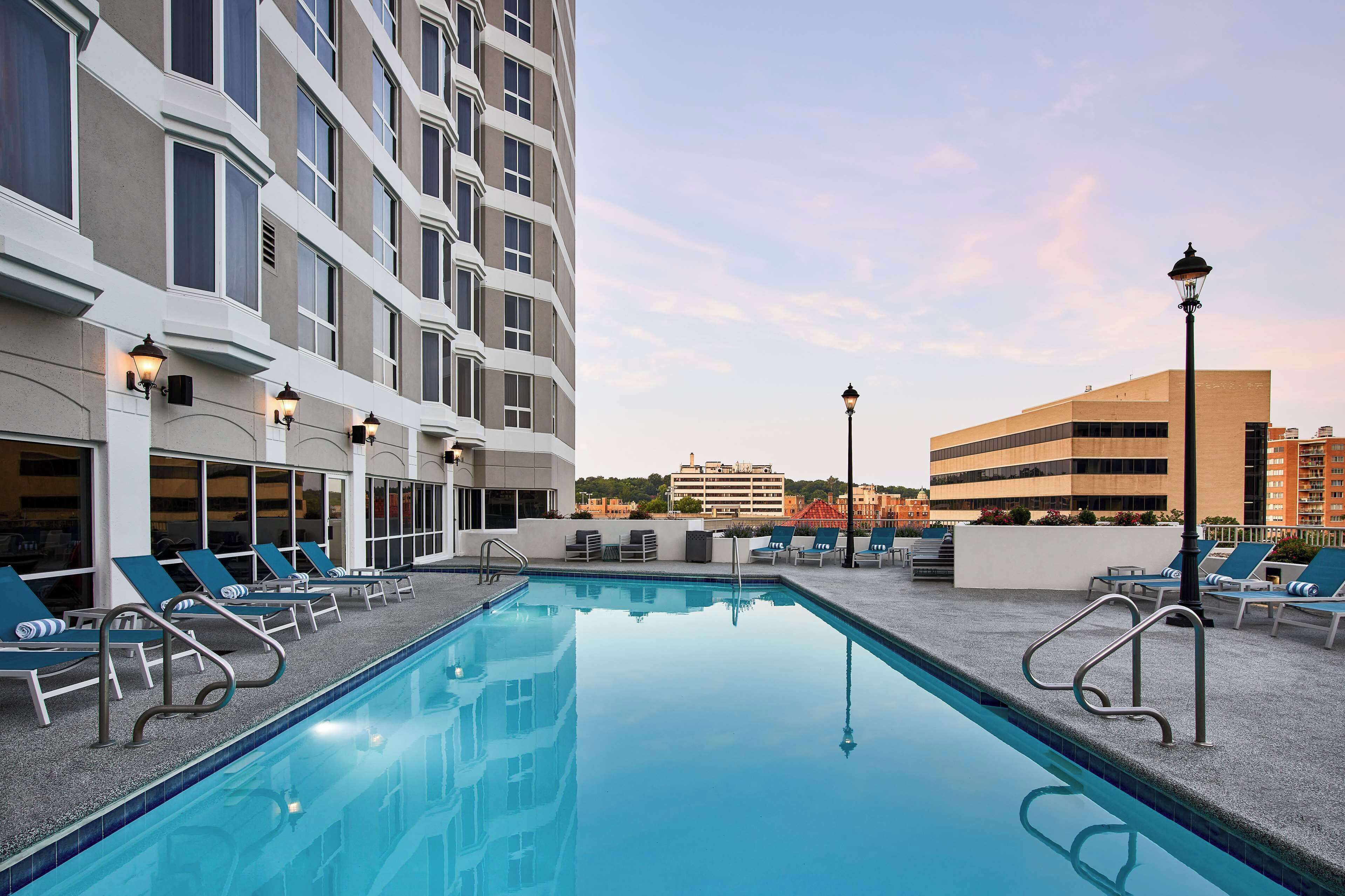 indoor pool, outdoor pool, open 6:00 am to 10:00 pm, pool loungers