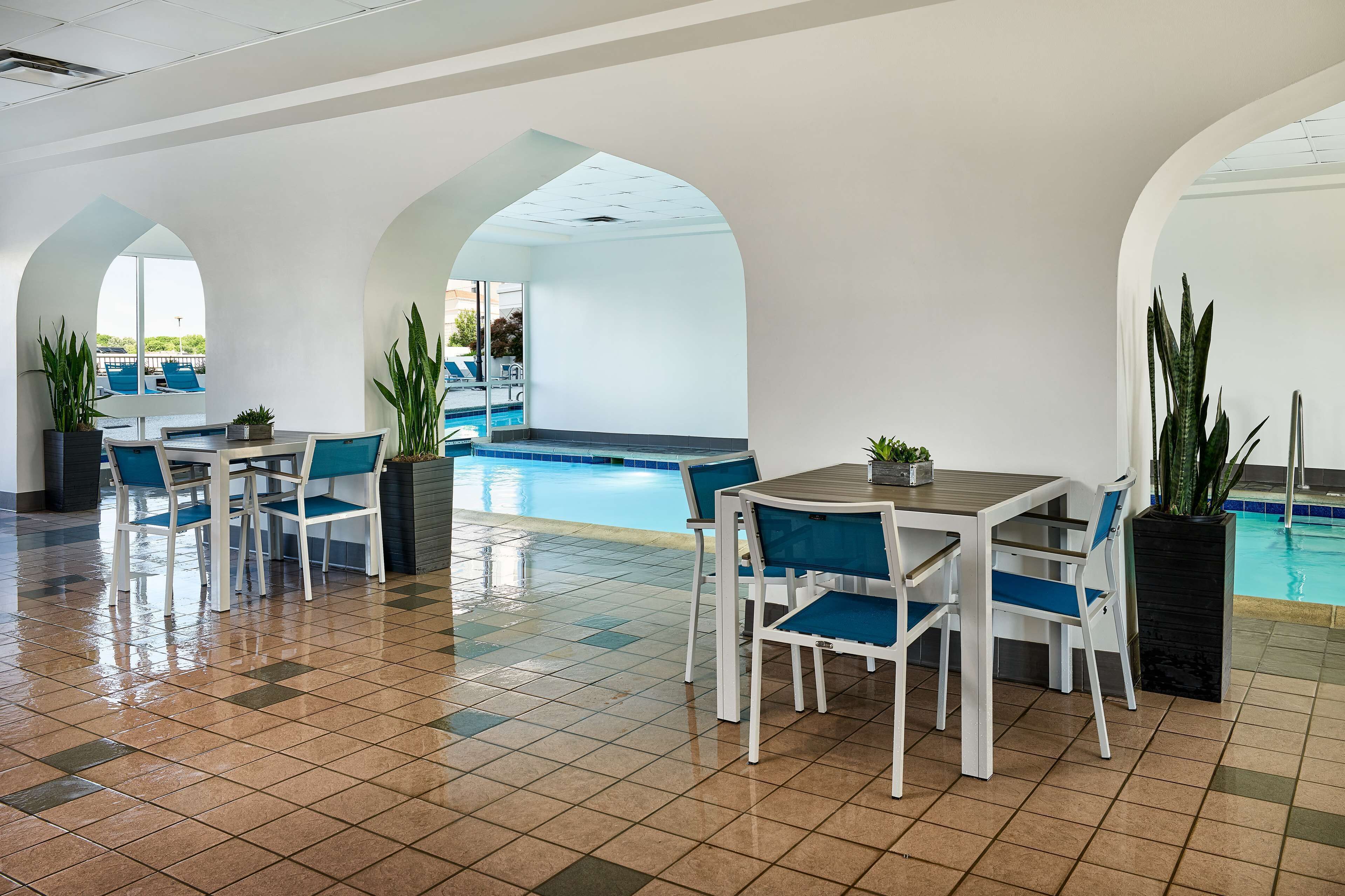 indoor pool, outdoor pool, open 6:00 am to 10:00 pm, pool loungers