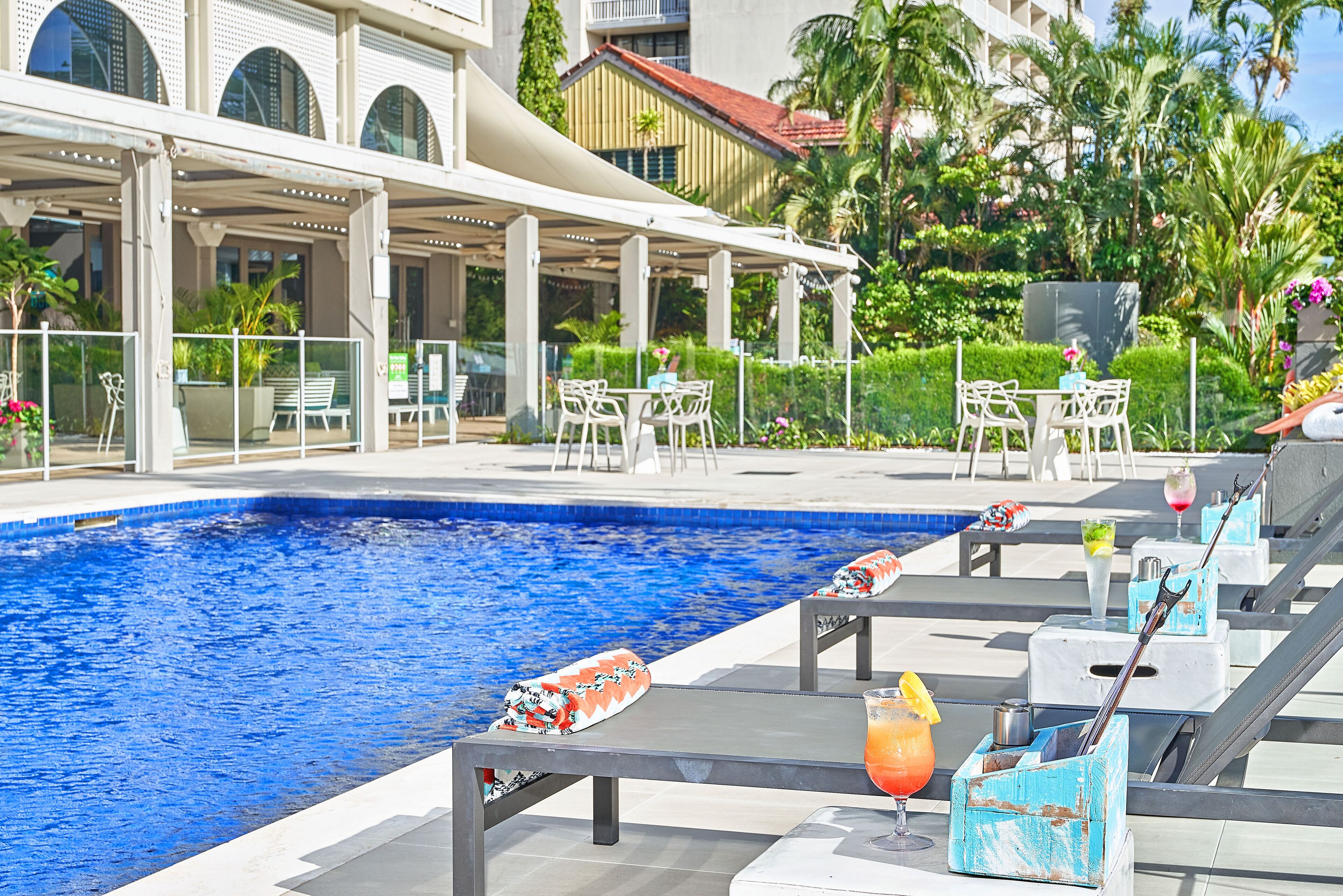 Outdoor pool, open 6:00 AM to 9:00 PM, pool umbrellas, sun loungers