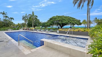 Outdoor pool, open 6:00 AM to 9:00 PM, pool umbrellas, pool loungers
