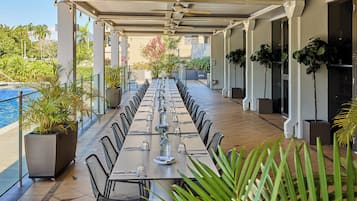 Breakfast, lunch served; local and international cuisine, pool views