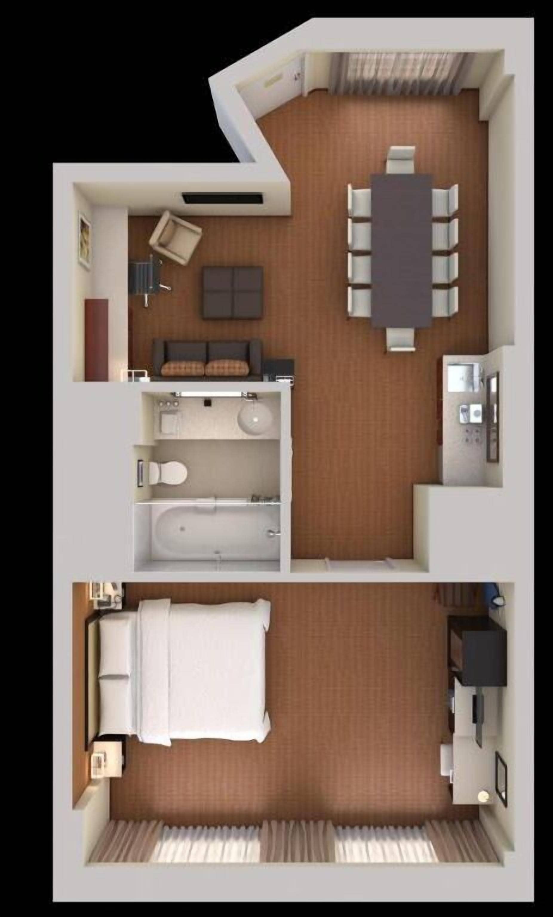 Distribución de una habitación de hotel con cama, escritorio, baño y zona de comedor.