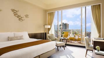 Deluxe Room, 1 King Bed, Balcony, Sea View | In-room safe, individually decorated, individually furnished, desk