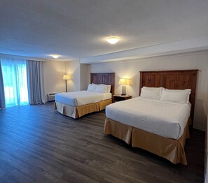 Suite, Multiple Beds, Non Smoking | Premium bedding, blackout curtains, soundproofing, iron/ironing board