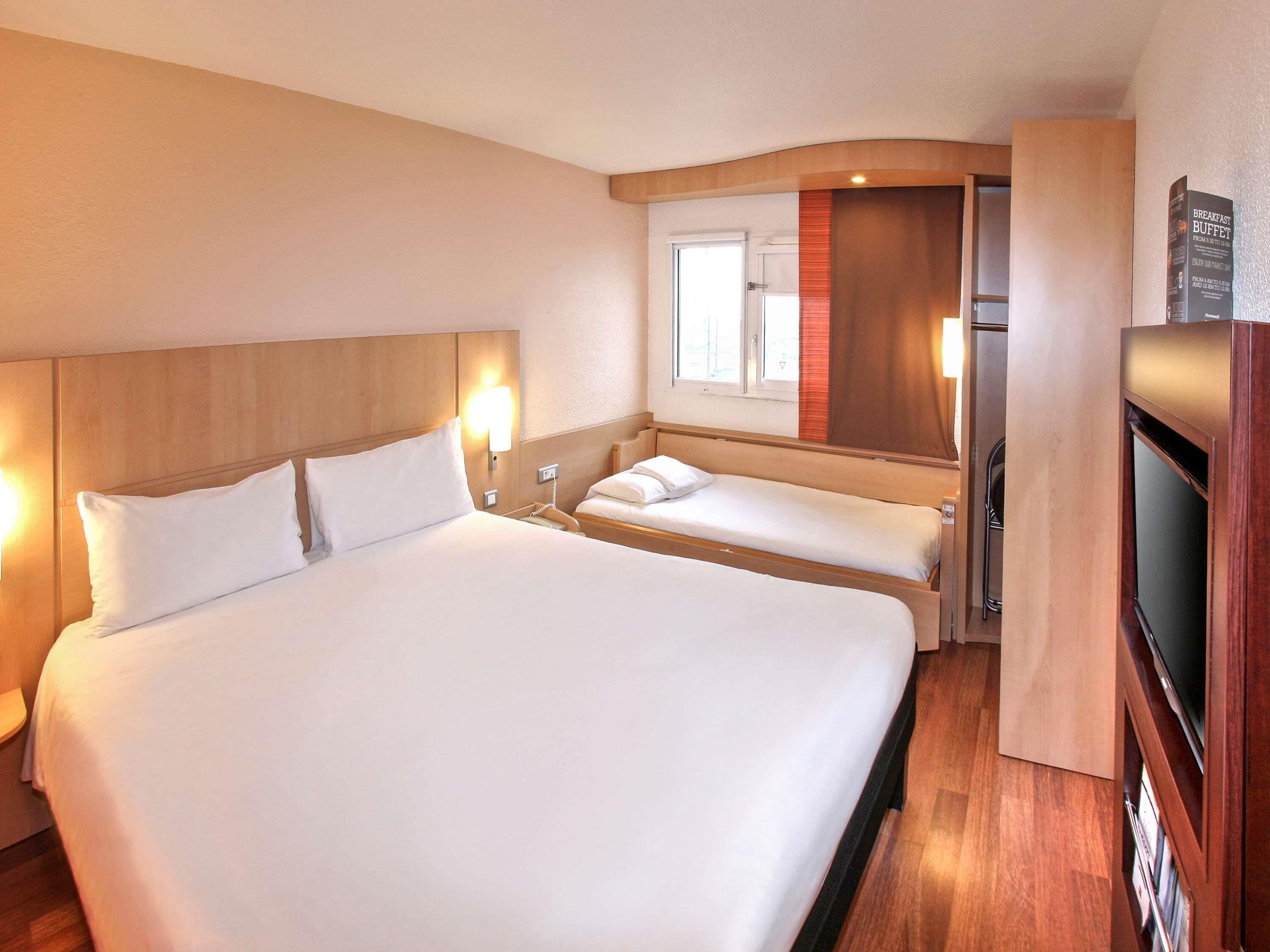 standard room, multiple beds | premium bedding, in-room safe, individually decorated