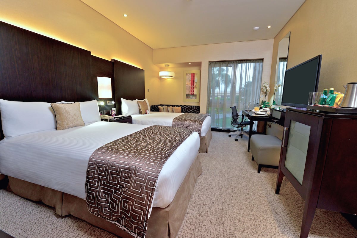 Premium bedding, free minibar items, in-room safe, desk