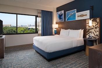 Premium bedding, in-room safe, iron/ironing board at DoubleTree Suites by Hilton Orlando - Disney Springs® Area
