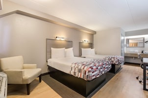 Deluxe Room, 2 Double Beds (Smoke Free) | In-room safe, desk, laptop workspace, blackout drapes