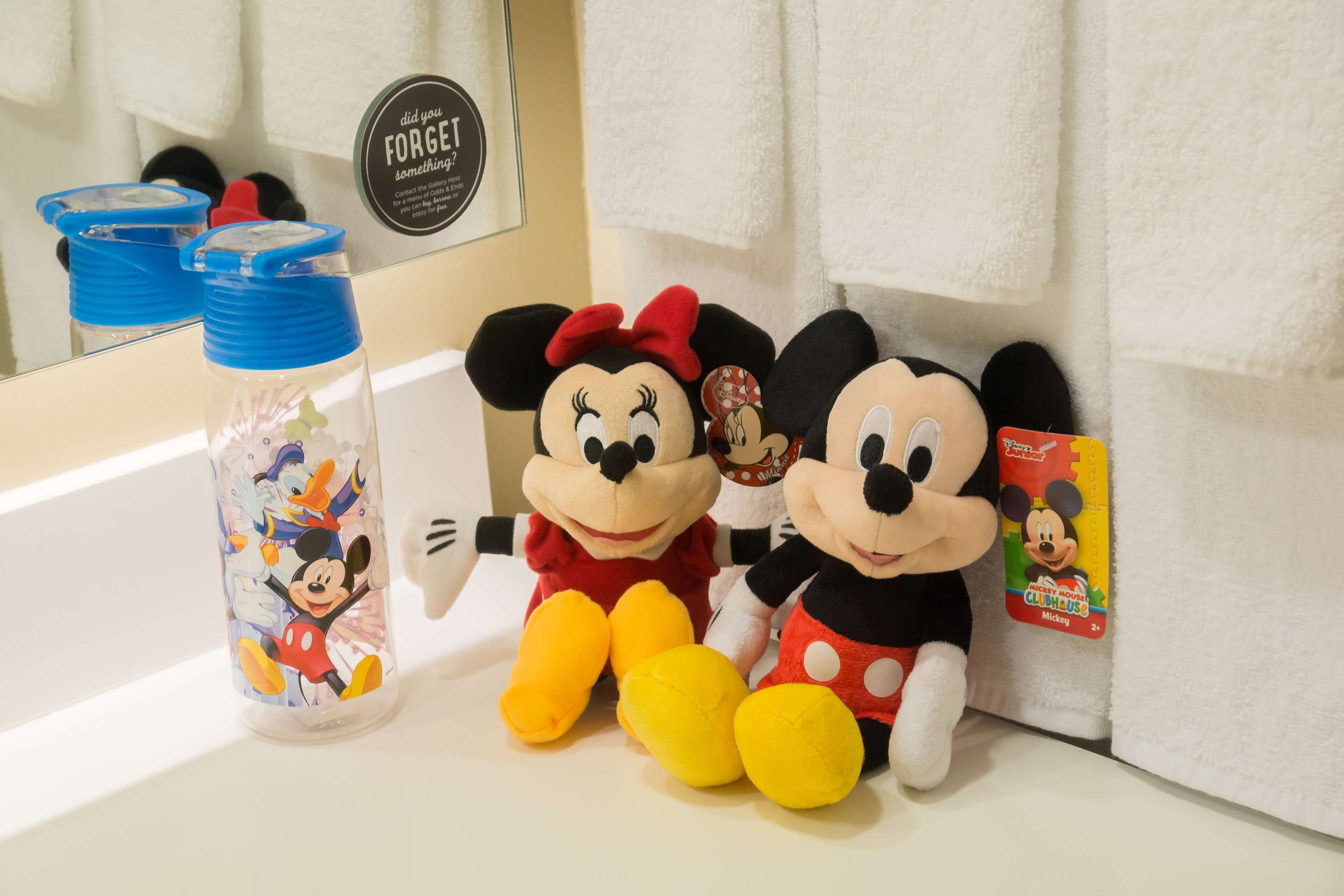 combined shower/bathtub, designer toiletries, hair dryer, towels