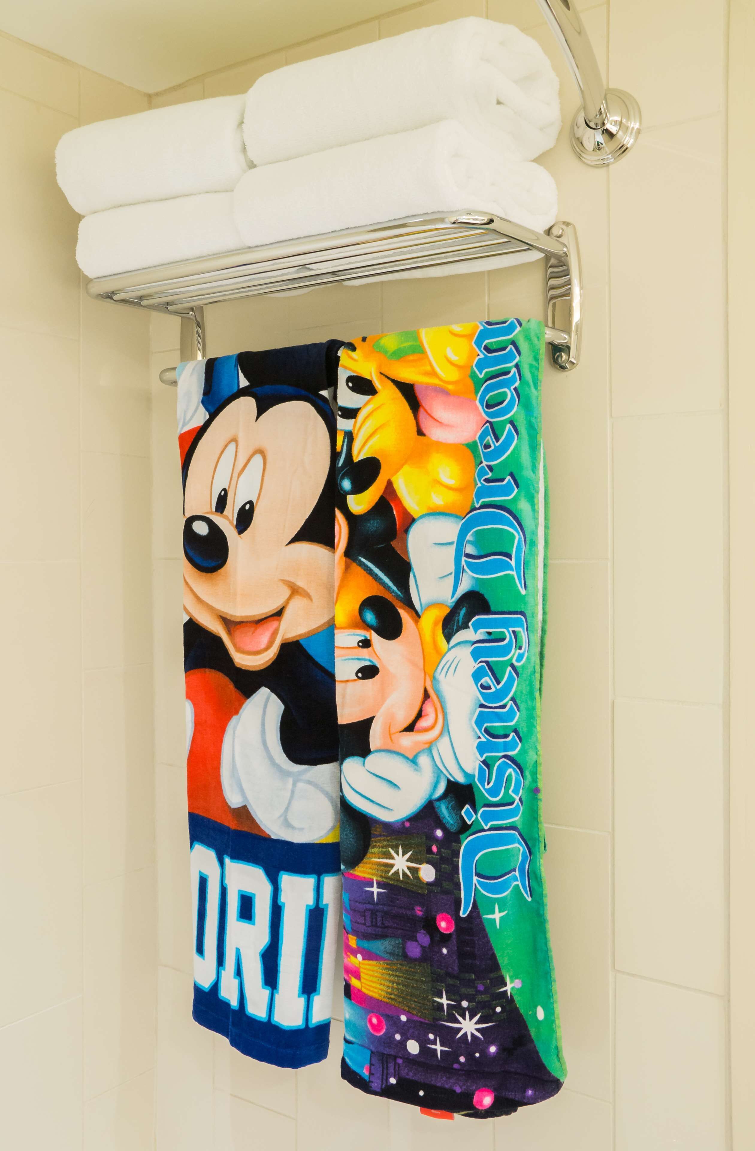 combined shower/bathtub, designer toiletries, hair dryer, towels